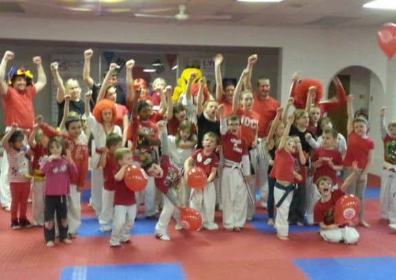 People of all ages donned red wigs and noses to raise money for Comic Relief at the Lynx Black Belt Leadership Academy in Retford.