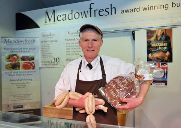 Meadowfresh of Chesterfield butcher at Arrow Farm Craig McGurk has won the annual Hodsock Snowdrop Festival Sausage Competition 2013, with his Cheese and Red Onion Sausage (w130320-2a)