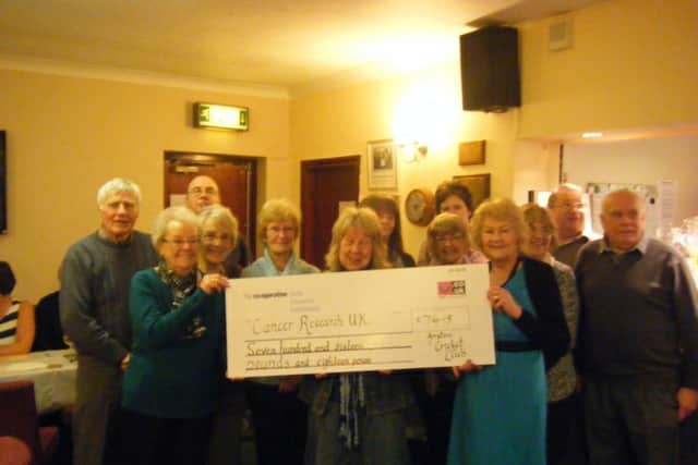 Cheque presentation to Cancer Research UK at Anston Cricket Club