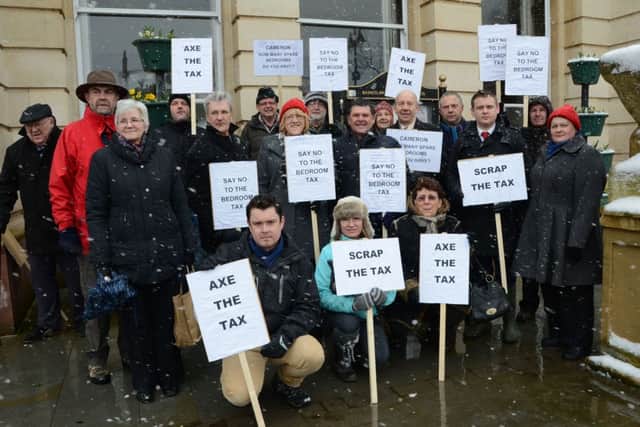 People gathered to protest about the Bedroom Tax outside Retford
Town Hall G130323-2a