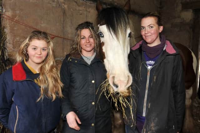 Feature on the Coloured Cob riding school which has won an award for its work with riders with mental health problems, pictured is owner Sharon Tolley, centre with from left Abi Hutchinson and Pippa Roberts