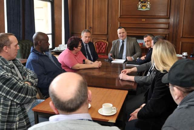 MP John Mann talks to local residents to find out how they are being affected by the bedroom tax, pictured are residents with John Mann MP, A1 Housing managing director Bernard Coleman, Mark Ladyman, BDC and Coun Alan Chambers. (w130404-1a)