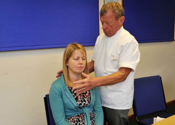 Feature on reiki healer Len Jones, Len is pictured with Guardian features writer Helen Johnston (w130412-2d)