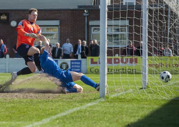 Action from Gainsbrough Trinity 2-1 win over Vauxhall Motors on Saturday afternoon. Gainsbrough score the first of their two goals
20 April  2013
Image © Paul David Drabble