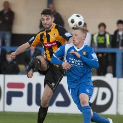Gainsborough Trinity (blue) v Boston United in the the Lincs Senior Shield Final at the Northolme, Gainsborough on Tuesday. Boston ran out winners with a 3-1 victory