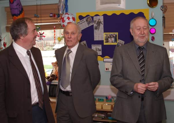 Three members of the Freemasons committee at the recent ceremony to provide £1,000 to Bluebell Wood Children's Hospice