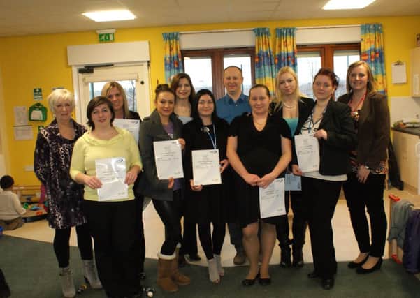 Fran Walker from NNC, back far left, with some of the learners on the first interpreter course at Manton Childrens Centre