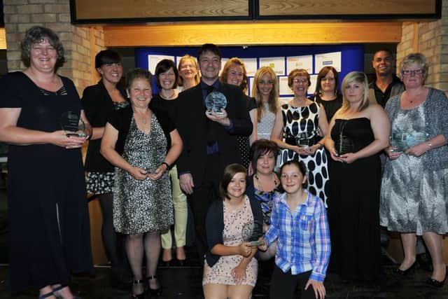 Gainsborough Standard Best in Schools Awards 2012, pictured are the winners with their trophies and compere Danny Oakes (G120704-1a)