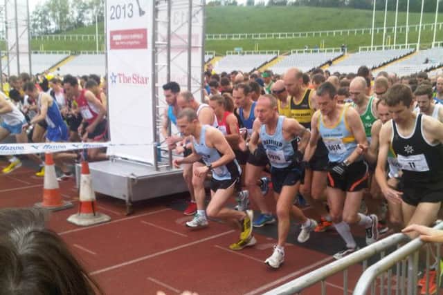 The Sheffield Half Marathon gets underway at Don Valley Stadium.