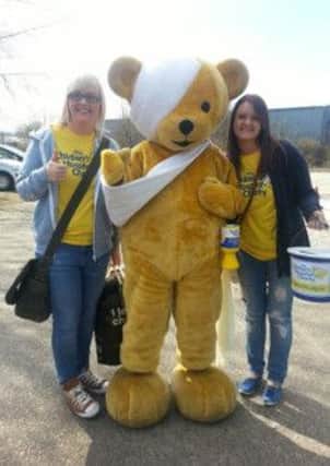 Kirsty and Lindsey Robinson fundraising with TCHC mascot Theo the Bear