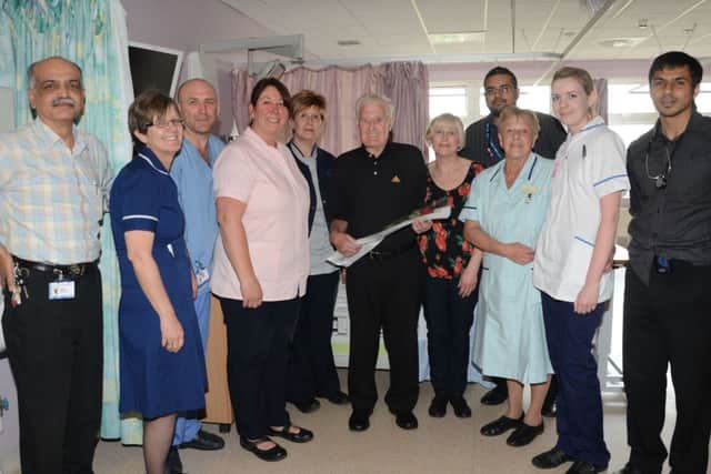 Geoff Coe presents The Guardian Rose to staff on the Cardiac Ward at Bassetlaw Hospital G130517-2a