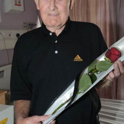 Geoff Coe presents The Guardian Rose to staff on the Cardiac Ward at Bassetlaw Hospital G130517-2b