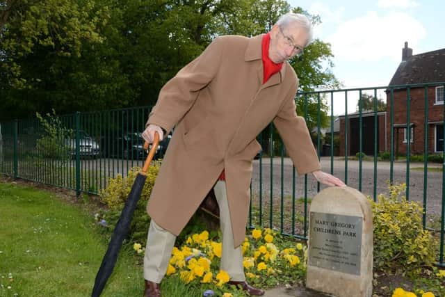 Todwick Parish Council have erected a plaque at Lindley's Croft Children's Playground in memory of Mary Gregory. Clive Pantry with the plaque G130524-1b