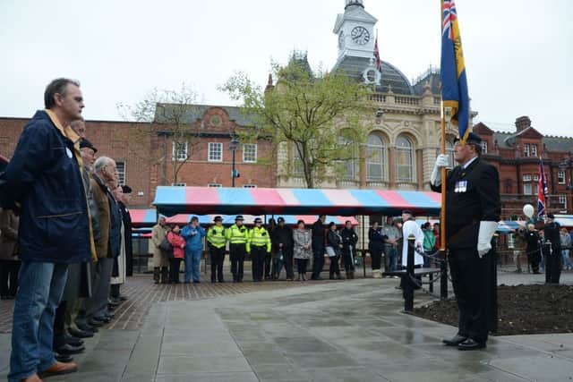 Retford residents gathered in the Market Place to pay their respects to Wollwich soldier Lee Rigby G130530-1m