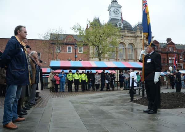 Retford residents gathered in the Market Place to pay their respects to Wollwich soldier Lee Rigby G130530-1m