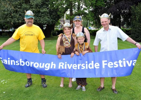 Gainsborough Riverside Festival King and Queen Riley Jackson-Parr, eight and Jessica Jackson-parr, nine with festival commitee members ,Tim Davies, Caz Davies and Gary Cooke ahead of this years event (w130604-1b)