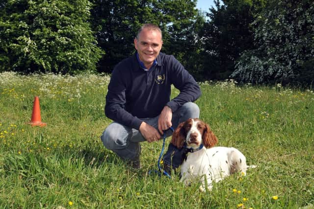 Steven Tindall has set up a new dog training class in Shireoaks, Steven is pictured with one of his pupils, Jake (w130601-1a)