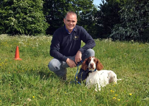 Steven Tindall has set up a new dog training class in Shireoaks, Steven is pictured with one of his pupils, Jake (w130601-1a)