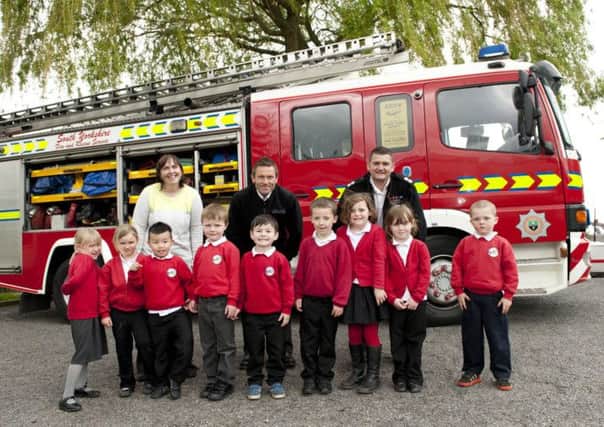 Firefighters from Maltby Blue Watch visited Maltby Manor Primary School on Wednesday in a fire engine so children to learn about what they do