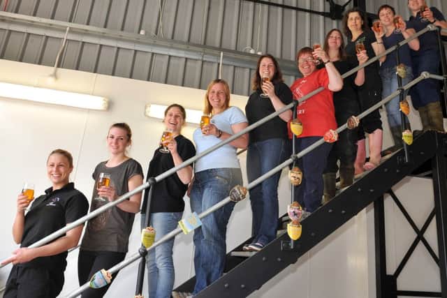Lady brewers got together at Welbeck Abbey Brewery to brew "Venus Red" as part of the Project Venus, which aims to highlight women brewers and get more women drinking real ale, pictured are lady brewers at the event with Welbeck Abbey head brewer Claire Monk at the top of the stairs (w130601-3a)