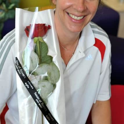 Guardian Rose presentation to PE teacher Mary Paton (w130607-1c)