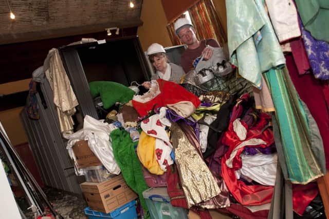Wales Methodist Panto Players director Nick Challenger and business manager Jayne Lemm appeal for help to replace and repair costumes damaged when the roof of the hall collapsed
