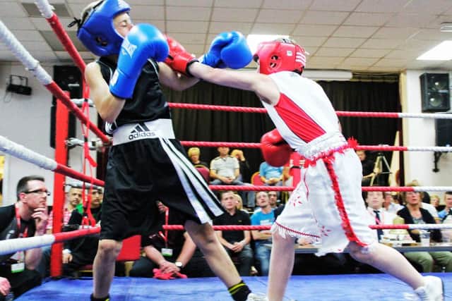 Barney Stretton lands a punch