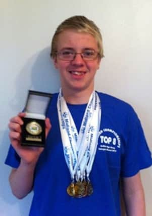 Thomas Atkinson with his medals