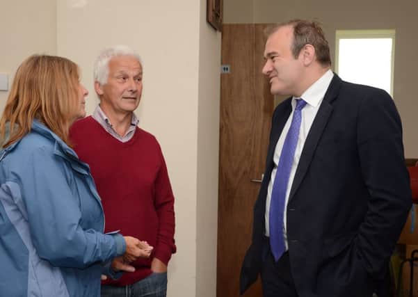 Secretary of State for Energy and Climate Change Edward Davey visited the Penny Hill Windfarm at Ulley and met local people in the village hall G130614-2b
