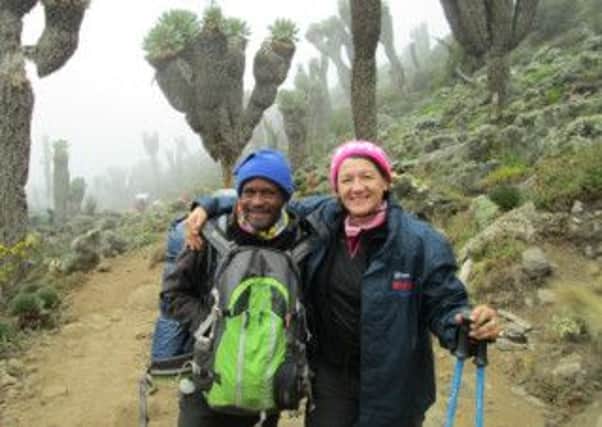 Tracy Haycox (right) and guide on Mount Kilimanjaro