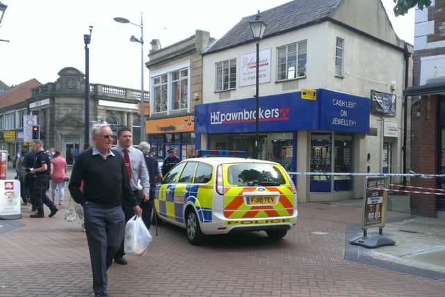 Police have taped off the scene outside H&T Pawnbrokers on Bridge Street this morning (Thursday 27th June)