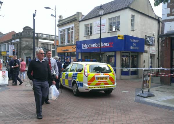 Police have taped off the scene outside H&T Pawnbrokers on Bridge Street this morning (Thursday 27th June)