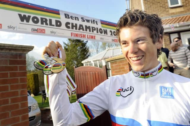 Pictured is local cyclist Ben Swift returning home to Whiston,Rotherham,from the World Championships in Australia where he won a Gold and 2 silver medals.Ben with his mum and dad Sandy & Mark and girlfiend Lizi Hamshaw