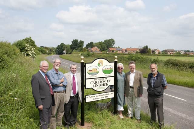 A new village sign for Carlton-In-Lindrick was unveiled by local councillors on Wednesday. (l-r): District and Parish Cllr Barry Bowles; Parish Cllr Ted Banks; Chairman of Environment Committee, Jim Creamer; Parish Cllr Chris Connolly; Leader Notts County Council, Cllr Alan Rhodes and Chairman Carlton Parish Council, Cllr Chris Smith
