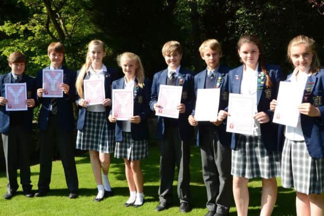 Pupils at Worksop College Prep School are presented with their Young Leaders Award G130625-1b