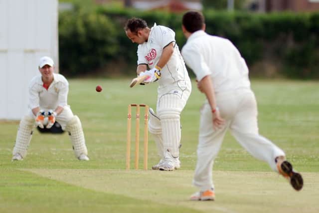 Lea Park v Teversal. Lea batsman Matt Housham loses his wicket G130714-9h