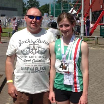 Heather Cooke with coach Dave Harmes