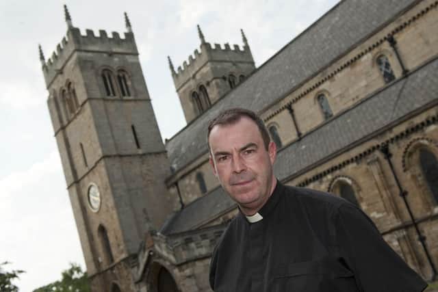 Father Nicolas Spicer at Priory Church, Worksop were theives broke into the boiler room and stole fixtures and fittings