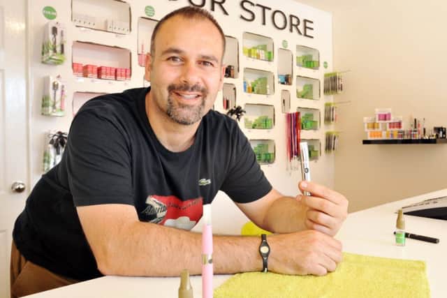 Feature on The Vapour Store, pictured is owner Giannis Florentzidis (w130718-6a)