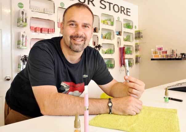 Feature on The Vapour Store, pictured is owner Giannis Florentzidis (w130718-6a)