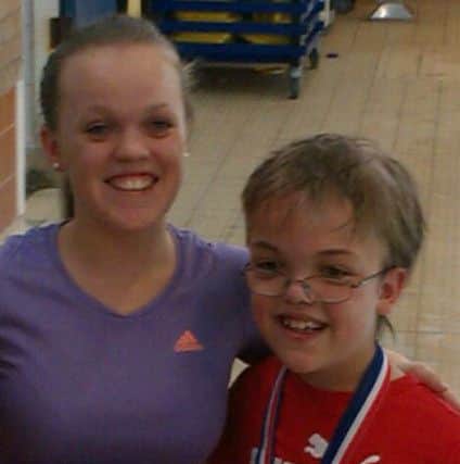 Seamus Morrison, right, with Ellie Simmons OBE