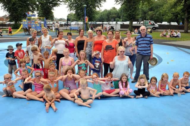 Dissapointed children and their families at the Canch Worksop, where the water has stopped flowing on one of the hottest days of the year