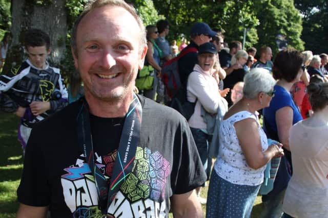 Ken Baker with his silver medal at the World Fire and Police Games