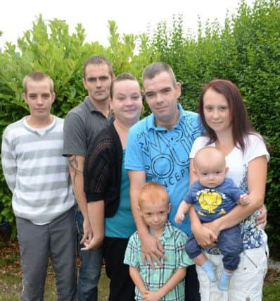 Kelly Wallis , her partner Ian and family are organising a family fun day at The Canch in September. Funds raised will go towards British Heart Foundation and the critical care unit at Sheffield Hospital where Ian, 30, received care after a heart attack G130814-1b