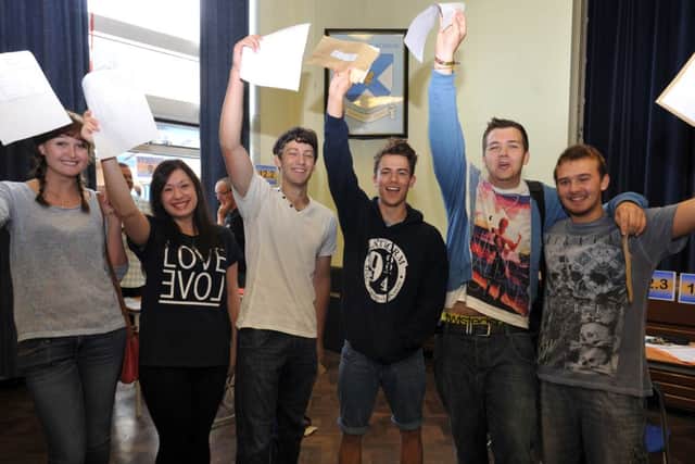 A level results day at Wales High School, students celebrate their results (w130815-2c)