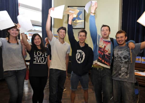 A level results day at Wales High School, students celebrate their results (w130815-2c)