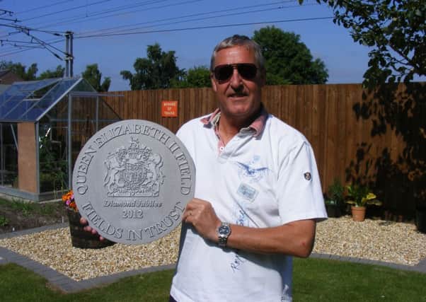 Ranskill Parish Council clerk, Mr Dave McAra pictured with the commemorative plaque which will be placed Ranskill Village Park.