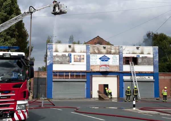 Firefighters tackle a blaze at a former bingo hall in Muglet Lane, Maltby on Monday