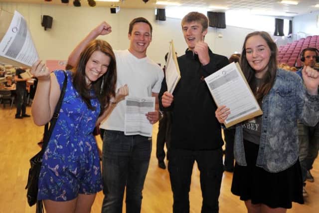 GCSE results day at Outwood Academy Portland, pictured are Charlotte Taylor, Hannah Sinnott, Adam Hughes and Adam Tomlin (w130822-2c)