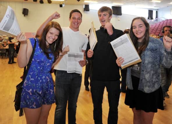 GCSE results day at Outwood Academy Portland, pictured are Charlotte Taylor, Hannah Sinnott, Adam Hughes and Adam Tomlin (w130822-2c)